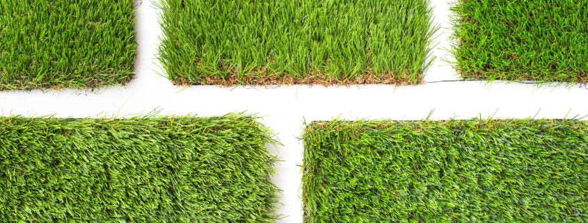 Detail of types of artificial grass in a sample book.