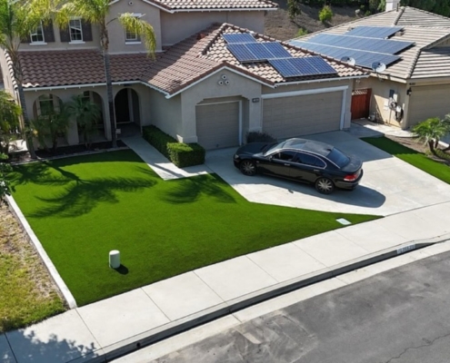 How to lay artificial turf on grass in a front yard installation
