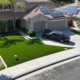 How to lay artificial turf on grass in a front yard installation